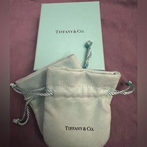 Tiffany and Co. jewelry box with 2 pouches.